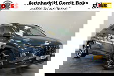 Hyundai Tucson Hybrid - 1.6 T-GDI PHEV Premium Sky 4WD Panoramadak Navigatie Full-led 24 maanden garantie mogelijk (*vraag naar de voorwaarden)