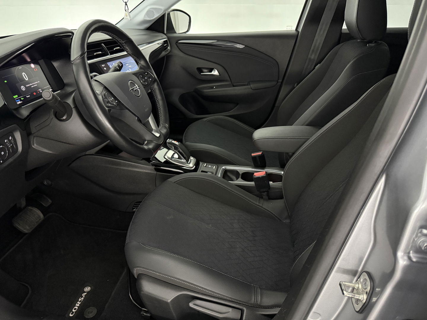 Opel CORSA-E Elegance 50 kWh | SOH 98% | Snelladen | Virtual | Carplay | Cruise | Stoel/Stuur verw. | Parkeersens. | NAP