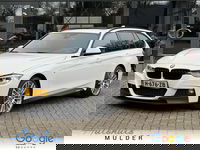 BMW 3 Serie - Touring 335i xDrive High Executive Pano/Trekhaak/HUD/Clima/Navi/Cruise