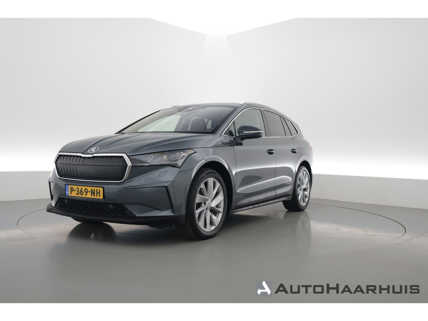 Škoda Enyaq iV 80 First Edition | Leder | Trekhaak | Adapt. Cruise | Camera | Memory seat | Navi | Keyless | CarPlay | Crystal light