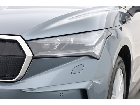 Škoda Enyaq iV 80 First Edition | Leder | Trekhaak | Adapt. Cruise | Camera | Memory seat | Navi | Keyless | CarPlay | Crystal light