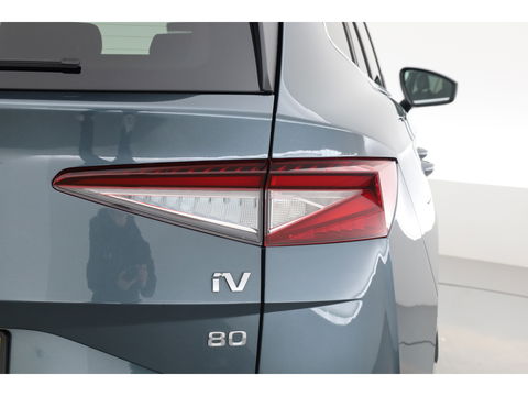 Škoda Enyaq iV 80 First Edition | Leder | Trekhaak | Adapt. Cruise | Camera | Memory seat | Navi | Keyless | CarPlay | Crystal light