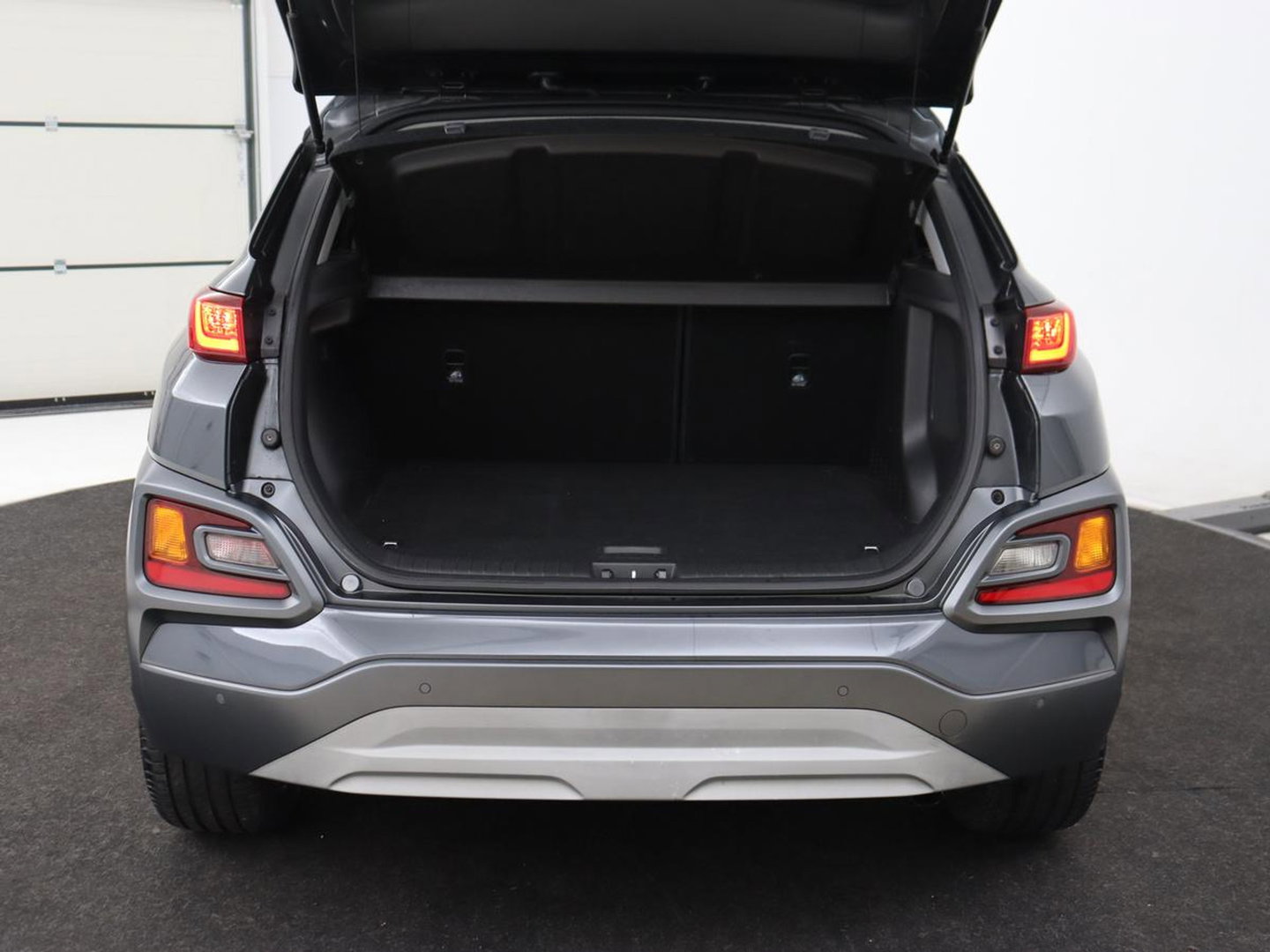 Hyundai KONA 1.6 GDI HEV Premium | Leder | Stoelventilatie | Adaptive cruise | Head-Up | Carplay | Camera | Achterbankverwarming | Navigatie | Keyless | Climate control