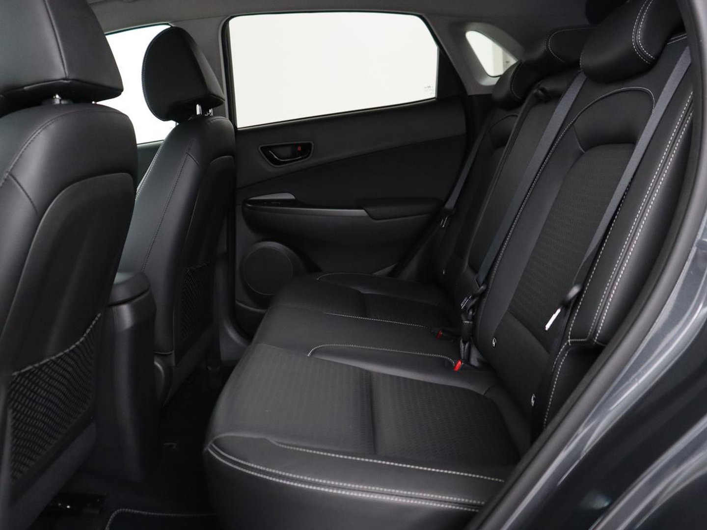 Hyundai KONA 1.6 GDI HEV Premium | Leder | Stoelventilatie | Adaptive cruise | Head-Up | Carplay | Camera | Achterbankverwarming | Navigatie | Keyless | Climate control