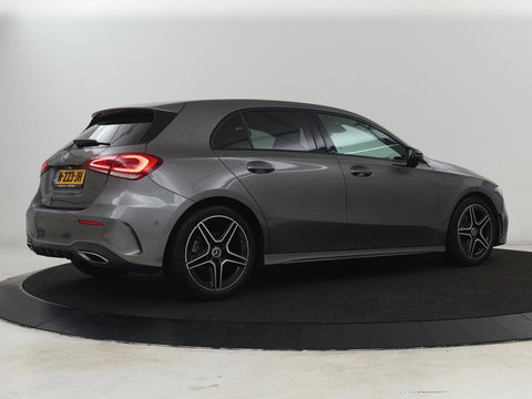 Mercedes-Benz A-Klasse 180 AMG | Stoelverwarming | Leder/Alcantara | Sfeerverlichting | Widescreen | Full LED | Park Assist | Navigatie | Sportstoelen | Climate control | Cruise control