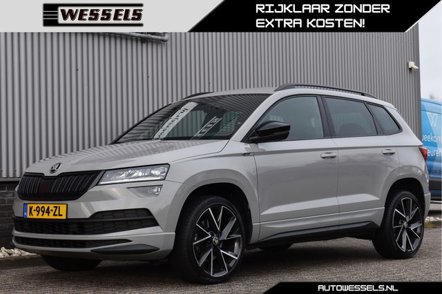 Škoda Karoq - 1.5 TSI ACT Sportline Business Virtual cockpit, Canton, Adaptive cruise, Carplay, Camera, Stoelverwarming