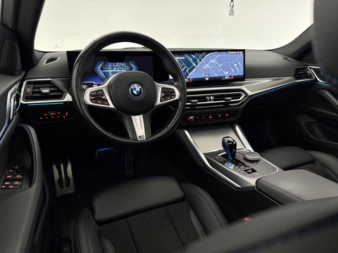 BMW i4 eDrive40 84 kWh M-Sport | SOH 94% | Snelladen | Pano | BMW Laser | Widescreen | Virtual | Adap. Cruise | Sfeer | Carplay | Camera | Stoelverw.