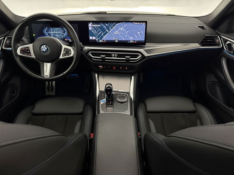 BMW i4 eDrive40 84 kWh M-Sport | SOH 94% | Snelladen | Pano | BMW Laser | Widescreen | Virtual | Adap. Cruise | Sfeer | Carplay | Camera | Stoelverw.