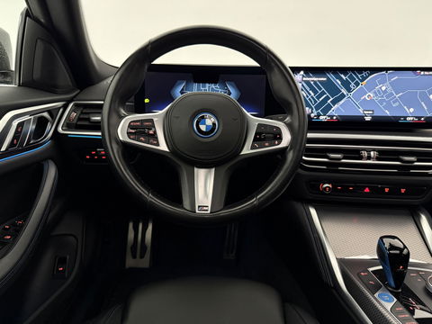 BMW i4 eDrive40 84 kWh M-Sport | SOH 94% | Snelladen | Pano | BMW Laser | Widescreen | Virtual | Adap. Cruise | Sfeer | Carplay | Camera | Stoelverw.