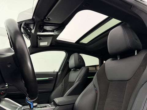 BMW i4 eDrive40 84 kWh M-Sport | SOH 94% | Snelladen | Pano | BMW Laser | Widescreen | Virtual | Adap. Cruise | Sfeer | Carplay | Camera | Stoelverw.