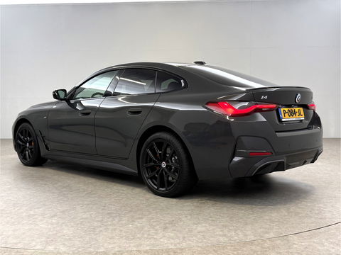 BMW i4 eDrive40 84 kWh M-Sport | SOH 94% | Snelladen | Pano | BMW Laser | Widescreen | Virtual | Adap. Cruise | Sfeer | Carplay | Camera | Stoelverw.