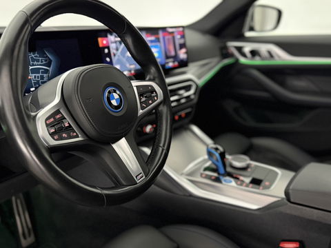 BMW i4 eDrive40 84 kWh M-Sport | SOH 94% | Snelladen | Pano | BMW Laser | Widescreen | Virtual | Adap. Cruise | Sfeer | Carplay | Camera | Stoelverw.