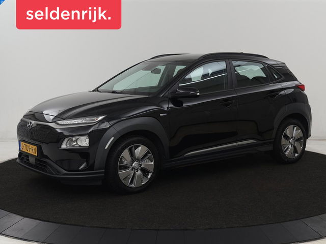 Hyundai KONA - EV Comfort 64 kWh | Adaptive cruise | Krell Audio | Warmtepomp | Keyless | Parkeerhulp | Digital Cockpit | Navigatie | Climate control