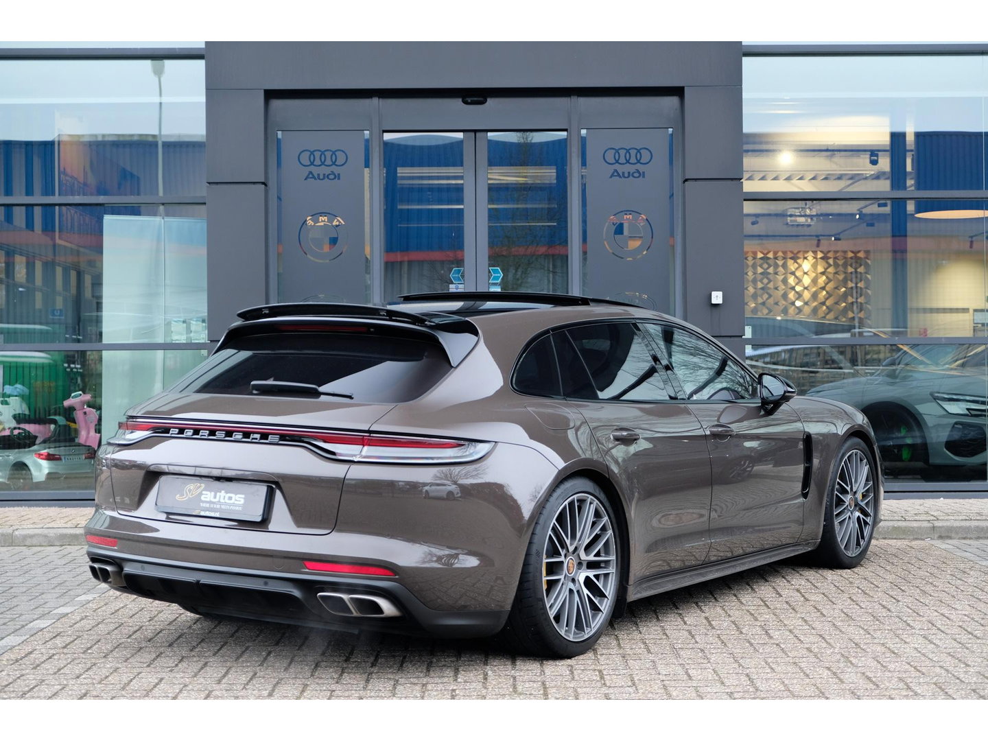 Porsche Panamera Sport Turismo 4.0 V8 Turbo S 700pk E-Hybrid Panoramadak Keramisch Luchtvering 4-wielsturing NLauto 1e eigenaar!