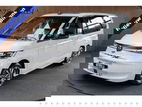 Volkswagen Multivan - 1.4 eHybrid 7p. Pano Navi Camera ACC PDC Elektr. bedienbare schuifdeuren Elektr. bedienbare achterklep Stoelverwarming Climate voor & achter Cruise C. LM velgen Splinternieuw! BTW auto!