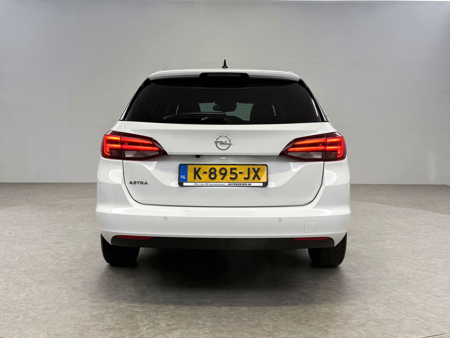 Opel Astra Sports Tourer 1.4 Elegance | Clima | Cruise | Camera | Carplay | Keyless | Navi | Parkeersens. | NAP