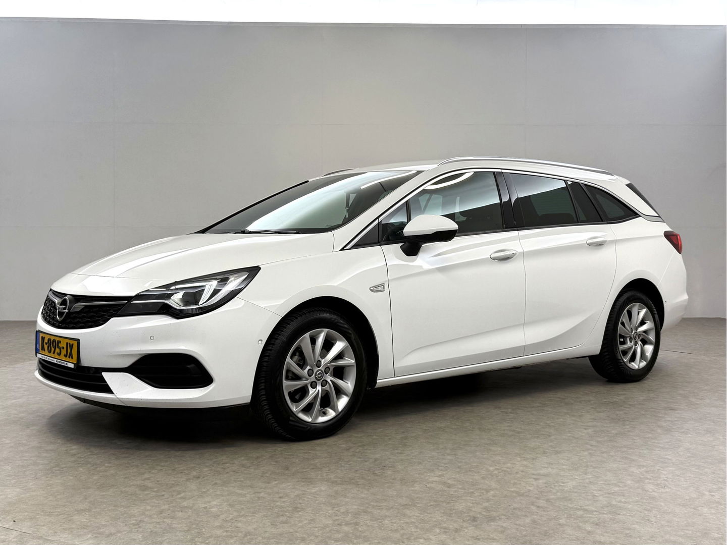 Opel Astra Sports Tourer 1.4 Elegance | Clima | Cruise | Camera | Carplay | Keyless | Navi | Parkeersens. | NAP
