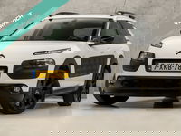Citroën C4 Cactus - 1.2 e-VTi Shine Automaat (PANORAMADAK, NAVIGATIE, CAMERA, LEDER, STOELVERWARMING, SPORTSTOELEN, GETINT GLAS, PARKEERSENSOREN, CRUISE, TREKHAAK, NIEUWSTAAT)
