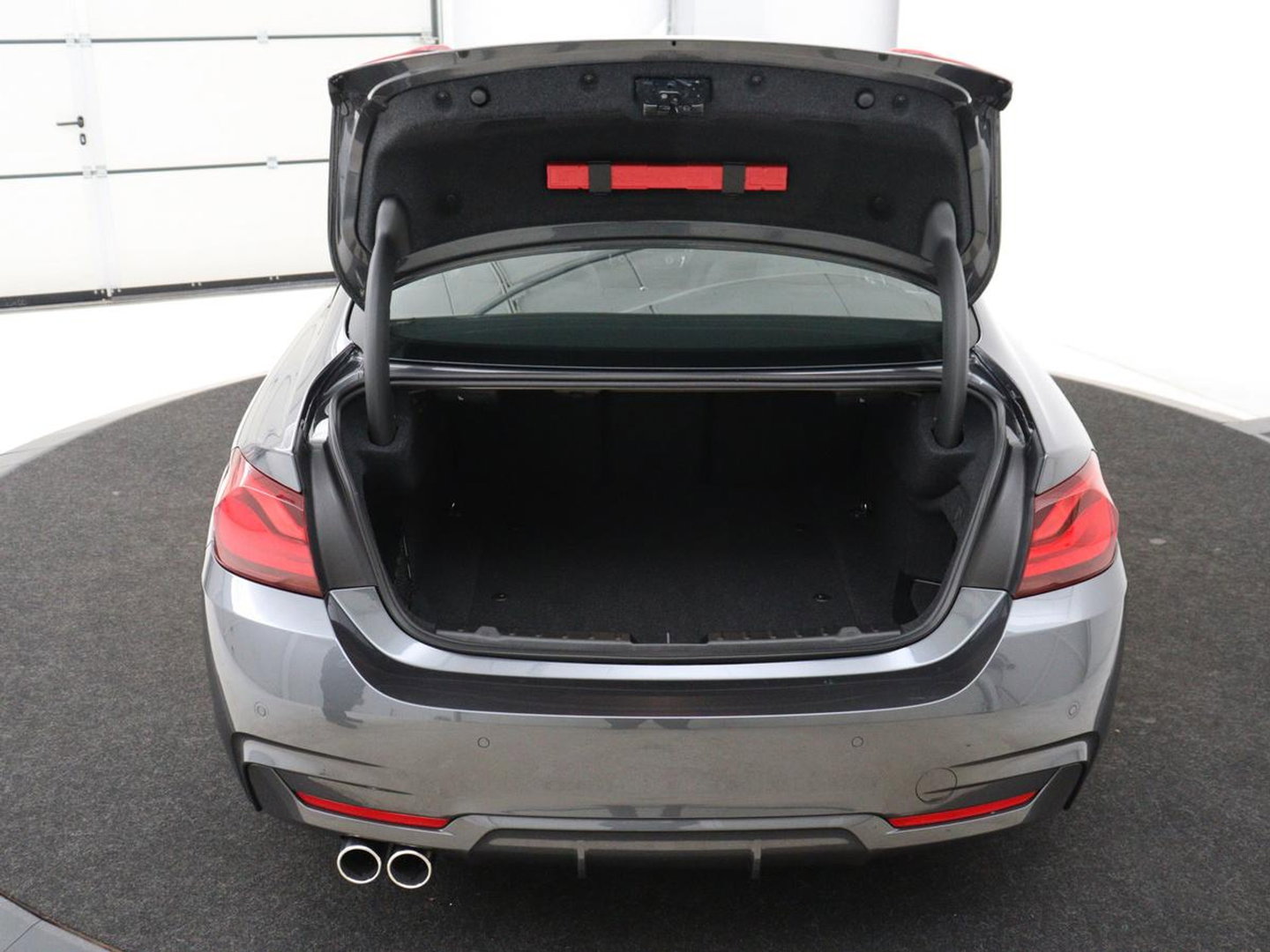 BMW 4 Serie Coupé 418i M Sport | Schuifdak | Leder | Stoelverwarming | 20'' | Sportstoelen | Full LED | Navigatie | Parkeerhulp | Climate control | Cruise control | 74.200km NAP