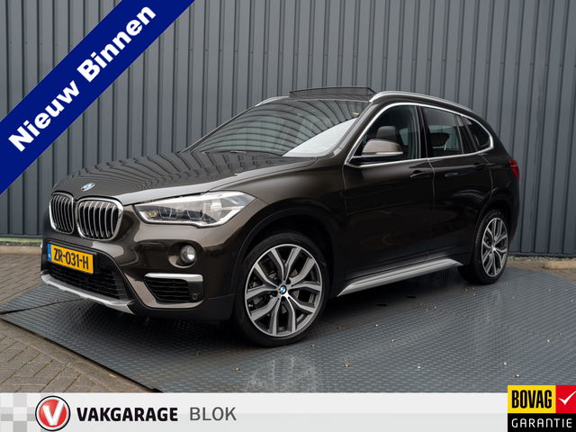BMW X1 - sDrive20i High Executive | Trekhaak afnb. | Panodak | Head Up | Camera | Elk. A-klep | Leder | Prijs Rijklaar!!