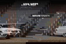 BMW 1 Serie - 118i Urban High Executive | Facelift | 2e eigenaar | Adaptive LED | Stoelverwarming | Sportstuur | Cruise control | Leer | Navigatie | Climate control | Bluetooth | 18 inch | PDC