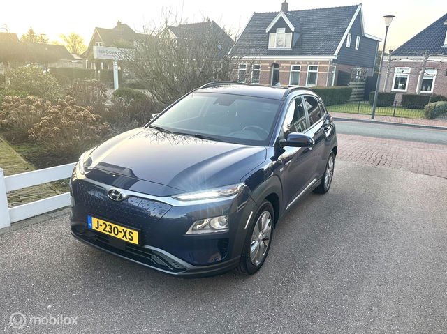 Hyundai Kona - EV Fashion Design 64 kWh SOH 100% ACCU GARANTIE TOT EN MET 2028 CARPLAY CAMERA STOELVERWARMING ZEER COMPLETE AUTO!!