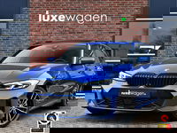 BMW 3 Serie - Touring 330e M-Sport Pano ACC Trekhaak HiFi 19inch