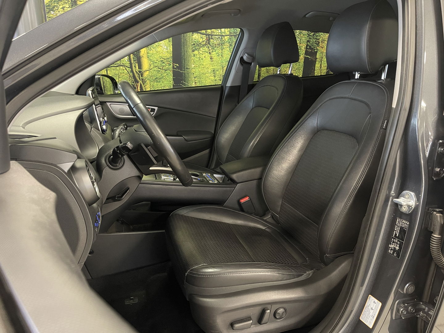 Hyundai KONA EV Comfort 64 kWh 3-Fase | SOH 100% | Adaptive Cruise Control | Achteruitrijcamera | Lederen Bekleding | Parkeersensoren Achter | Stoelverwarming | Keyless | Apple Carplay | Android Auto |