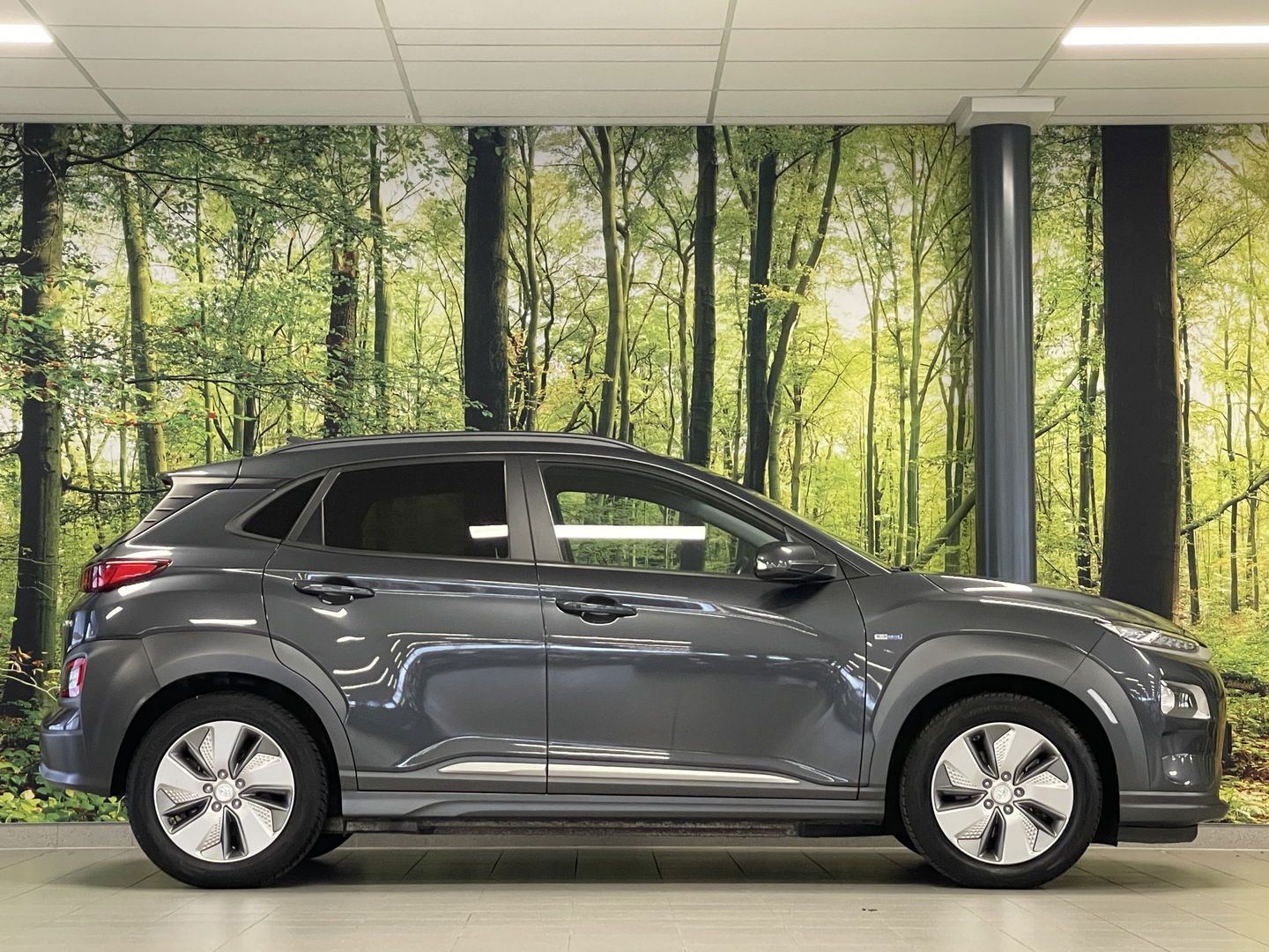 Hyundai KONA EV Comfort 64 kWh 3-Fase | SOH 100% | Adaptive Cruise Control | Achteruitrijcamera | Lederen Bekleding | Parkeersensoren Achter | Stoelverwarming | Keyless | Apple Carplay | Android Auto |