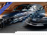Škoda Karoq - 1.5 TSI ACT Panodak Navi Virtual Stoelverwarming Cruise PDC LM velgen