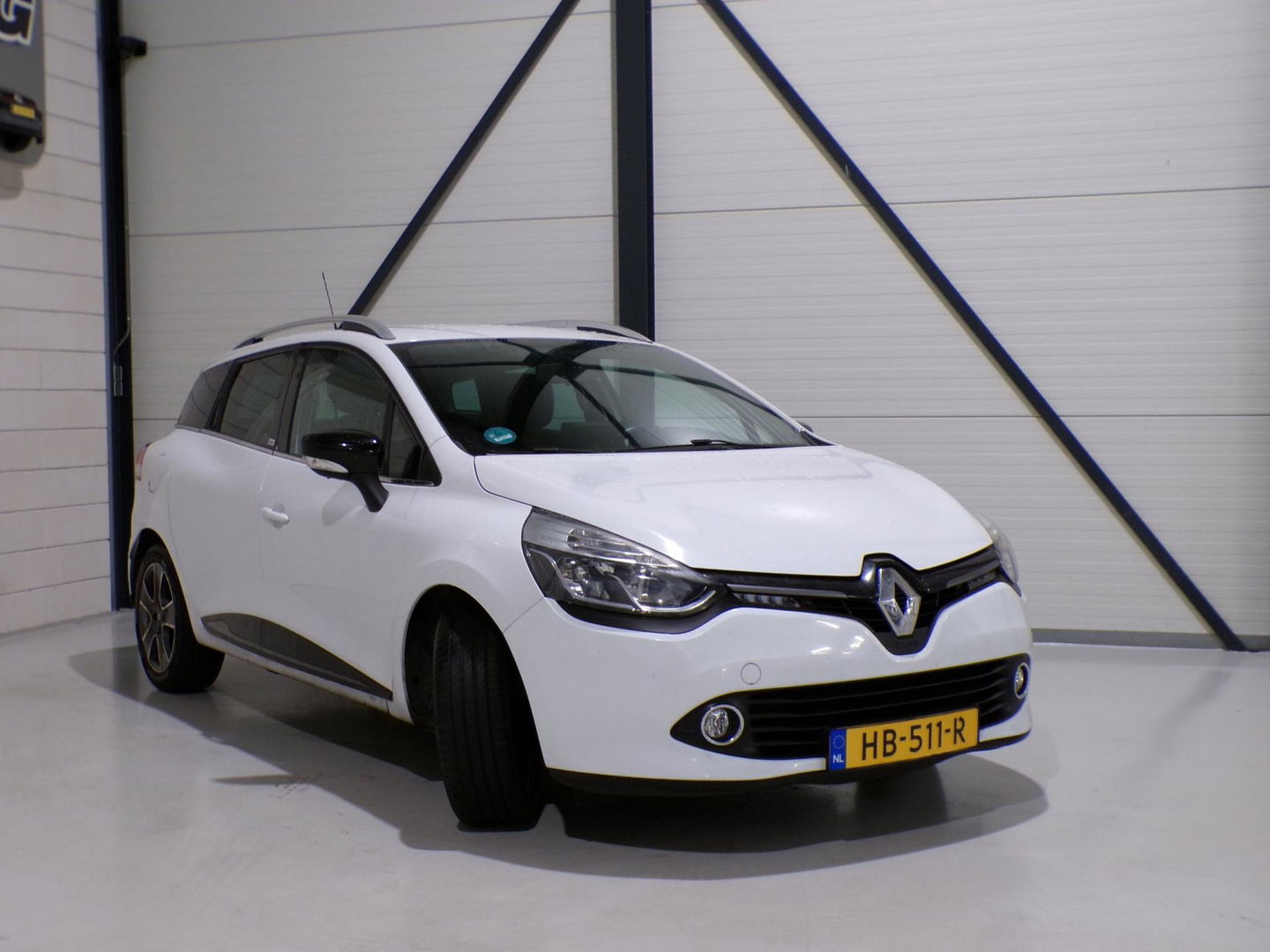 Renault Clio Estate 1.5 dCi ECO Night&Day "Origineel NL!" Bluetooth Navigatie Winterbanden Camera Parkeersensoren Airco Keyless