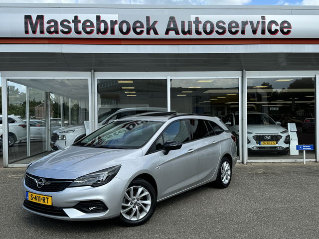 Opel Astra - Sports Tourer 1.2 Blitz Elegance Schuif kanteldak Staat in Hardenberg