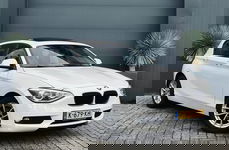 BMW 1 Serie - 116i Schuifdak/Navi/PDC