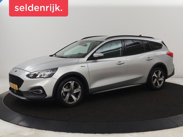 Ford Focus - 1.0 EcoBoost Hybrid Active | Stoelverwarming | Trekhaak | Camera | Stuurverwarming | Carplay | Keyless | Full LED | Navigatie | Parkeerhulp | Climate control | Cruise control