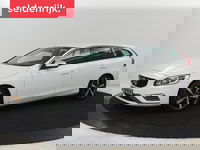 Volvo V60 - 2.0 T4 Sport | Adaptive cruise | Stoelverwarming | Camera | Trekhaak | Leder/Alcantara | Bi-Xenon | Sportstoelen | Climate control | R Design