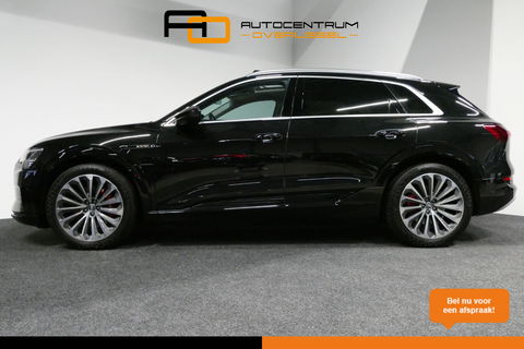 Audi e-tron 55 quattro Business Edition Plus 95 kWh / SOH 89% / Panoramadak / Elektr. verstelbare voorstoelen (links memory) / Luchtvering / Apple Carplay - Android Auto / Ambienteverlichting / Matrix LED koplampen / Stoelverwarming / Achteruitrijcamera / Adaptive Cr