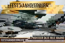 Porsche Cayenne - Coupé 3.0 E-Hybrid 462PK Krijtgrijs SportDesign Luchtvering Lightweight Package Carbon Dak 4-wielsturing NLauto