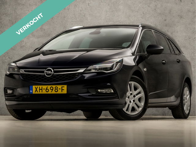 Opel Astra - Sports Tourer 1.0 Sport (APPLE CARPLAY, GROOT NAVI, CLIMATE, TREKHAAK, SPORTSTOELEN, GETINT GLAS, PARKEERSENSOREN, NIEUWSTAAT)