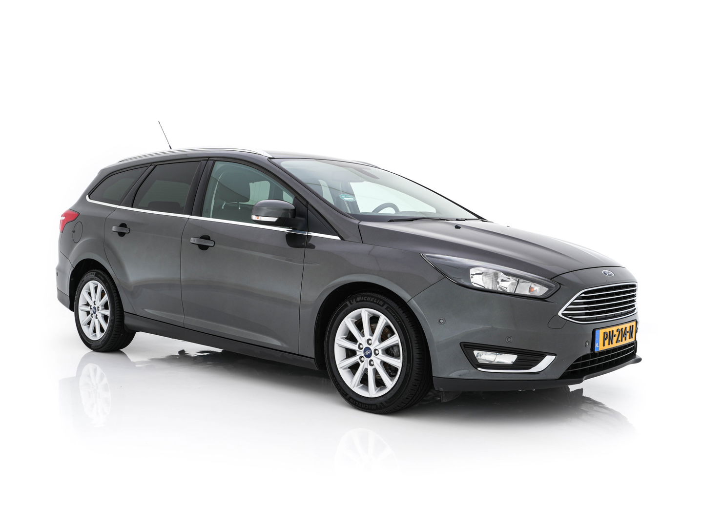 Ford FOCUS Wagon 1.5 TDCI Titanium Lease Edition (INCL-BTW) Aut. *NAVI-FULLMAP | HEATED-COMFORTSEATS | KEYLESS | PRIVACY-GLASS | ECC | SYNC-AUDIO | PDC | CRUISE | 16''ALU*