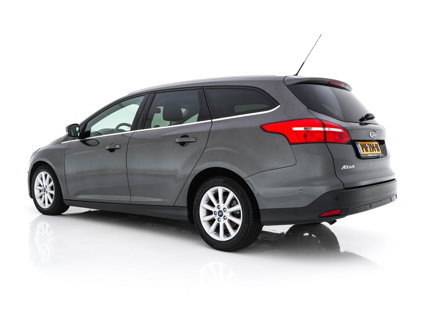 Ford FOCUS Wagon 1.5 TDCI Titanium Lease Edition (INCL-BTW) Aut. *NAVI-FULLMAP | HEATED-COMFORTSEATS | KEYLESS | PRIVACY-GLASS | ECC | SYNC-AUDIO | PDC | CRUISE | 16''ALU*