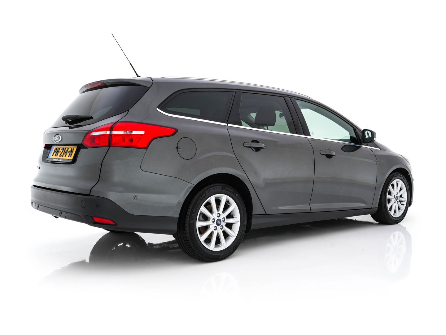 Ford FOCUS Wagon 1.5 TDCI Titanium Lease Edition (INCL-BTW) Aut. *NAVI-FULLMAP | HEATED-COMFORTSEATS | KEYLESS | PRIVACY-GLASS | ECC | SYNC-AUDIO | PDC | CRUISE | 16''ALU*