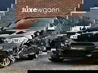 BMW X5 - M50d 381pk grijs kenteken Pano HUD H/K Trekh 20inch