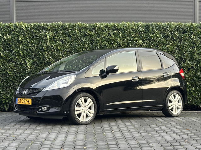 Honda Jazz - 1.4 COMFORT PLUS, AUTOMAAT, CRUISE, ECC-AIRCO, ELEKTRISCHE RAMEN, PDC, LICHTMETAAL 16"