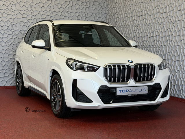 BMW X1 - SDRIVE M-SPORT SHADOW LINE NAVI LED ELEK.KLEP ADAP.CRUISE LEER/ALCANTARA CAMERA M-SPORT INTERIEUR / EXTERIEUR ✅ Top Auto's. Al 30 Jaar uw Bmw Specialist in ,  BMW M / M Sport / PHEV / HEV / Hybrid / Mhev / 25e / 30e / xDrive25e // xDrive30e / sDrive18i / 