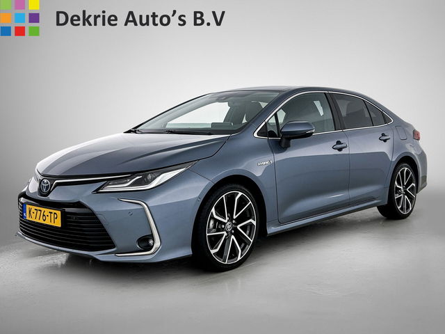 Toyota Corolla - 1.8 Hybrid Executive Sedan / Leder / Navigatie / Xenon / Pdc.V+A / Airco-ecc./ Radio multimedia / Apk 03-2027