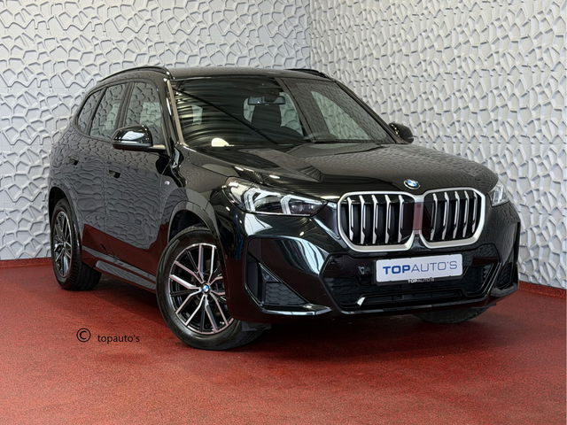 BMW X1 - SDRIVE M-SPORT SHADOW LINE NAVI LED ELEK.KLEP CRUISE LEER/ALCANTARA CAMERA M-SPORT INTERIEUR / EXTERIEUR ✅ Top Auto's. Al 30 Jaar uw Bmw Specialist in ,  BMW M / M Sport / PHEV / HEV / Hybrid / Mhev / 25e / 30e / xDrive25e // xDrive30e / sDrive18i / sDriv