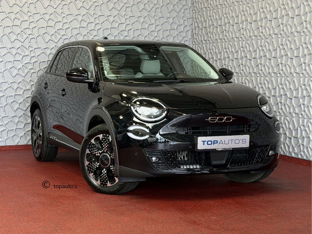 Fiat 600 - 1.2 HYBRID LA PRIMA LEER MASSAGE ELEK.STOEL CAMERA CARPLAY ADAP.CRUISE STOELVERW. ELEK.KLEP 18''LMV ✅ Top Auto Fiat Wijchen , 30 Jaar ervaring in Fiat , Wij leveren de : Icon / La Prima / Pop / Sport . Urban / Benzine / Hybrid . Met Fabrieksgarantie ✅