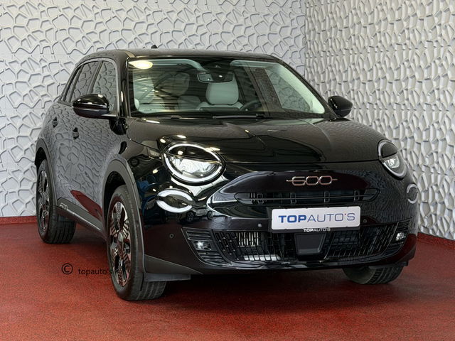Fiat 600 - 1.2 HYBRID LA PRIMA ELEK.KLEP 18''LMV LEER MASSAGE ELEK.STOEL CAMERA CARPLAY ADAP.CRUISE STOELVERW. ✅ Top Auto Fiat Wijchen , 30 Jaar ervaring in Fiat , Wij leveren de : Icon / La Prima / Pop / Sport . Urban / Benzine / Hybrid . Met Fabrieksgarantie ✅