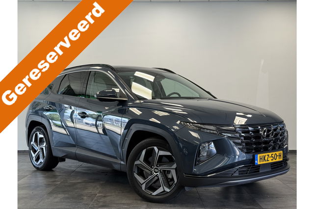 Hyundai Tucson Hybrid - 1.6 T-GDI PHEV Premium Sky 4WD Panoramadak Navigatie Full-led 24 maanden garantie mogelijk (*vraag naar de voorwaarden)