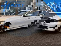 BMW 3 Serie - Touring 320d HIGH EXECUTIVE SPORTLINE 190 PK AUT. *ALPINWEISS* + ELEK. TREKHAAK | LASER LED | 18 INCH | STOEL/STUURWIELVERW.